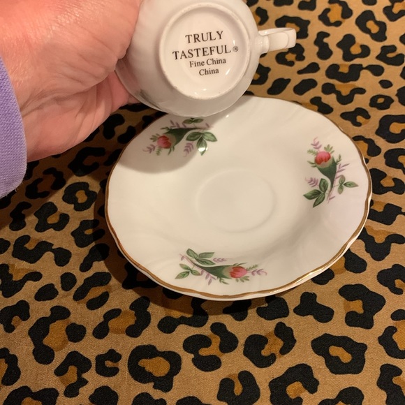 Rose teacup set gently displayed. - Picture 2 of 2